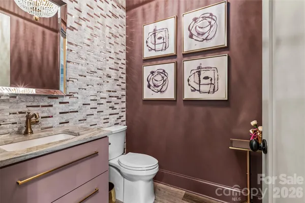 a bathroom with a toilet and a sink