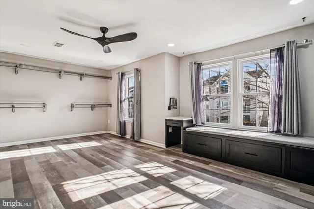 a view of a kitchen with a sink and a window