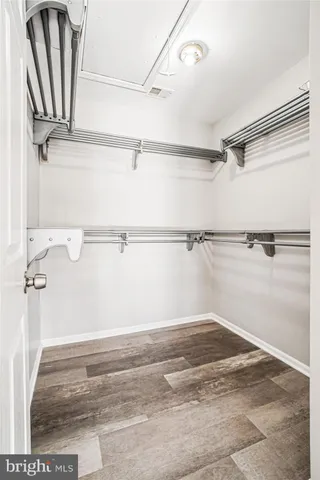 a view of a room with racks on the wall