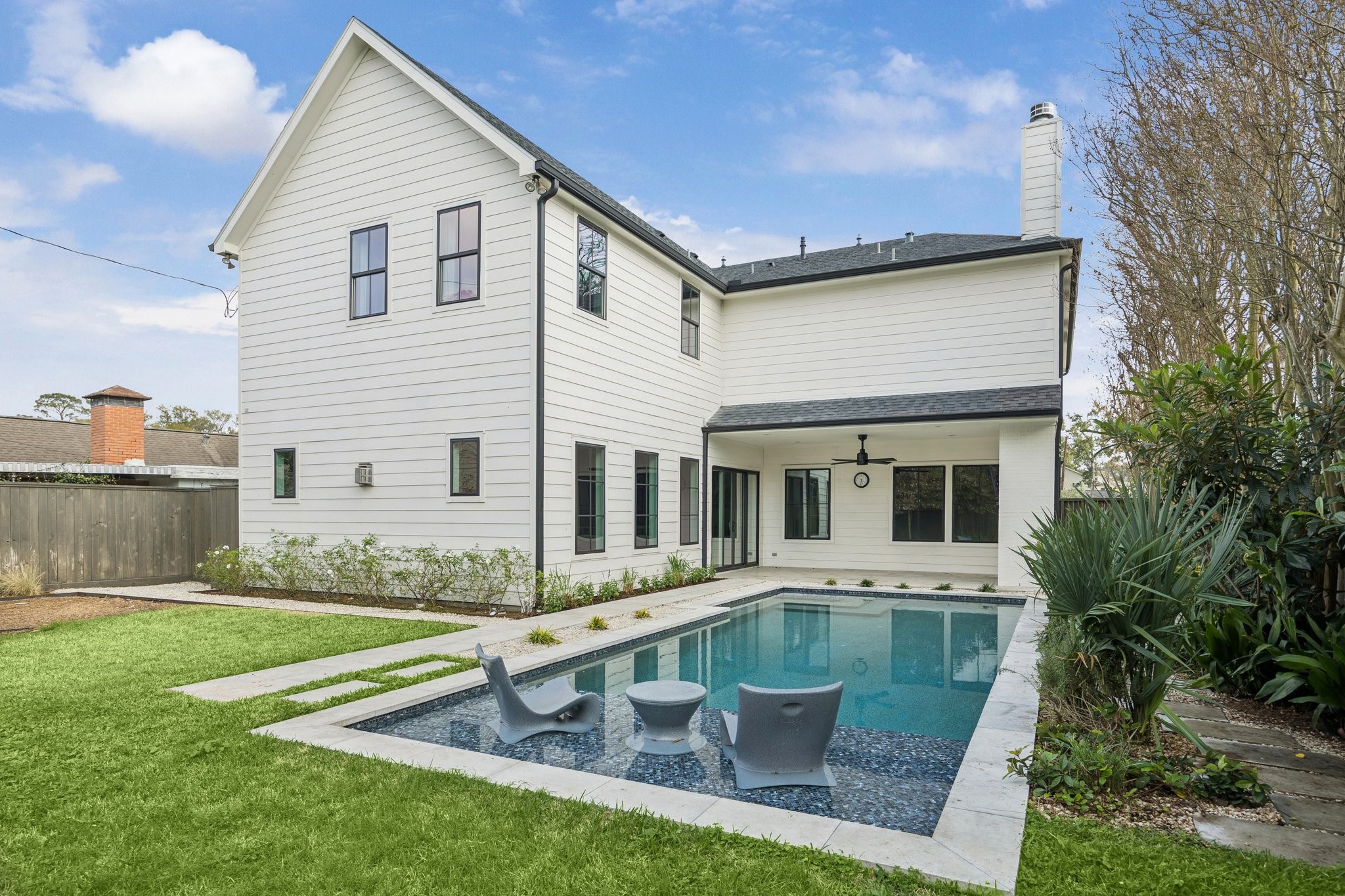 4219 Alba Road Houston, TX 77018 - Photo 12 of 37 Covered patio and pool view, ideal for indoor-outdoor living and entertaining year-round.
