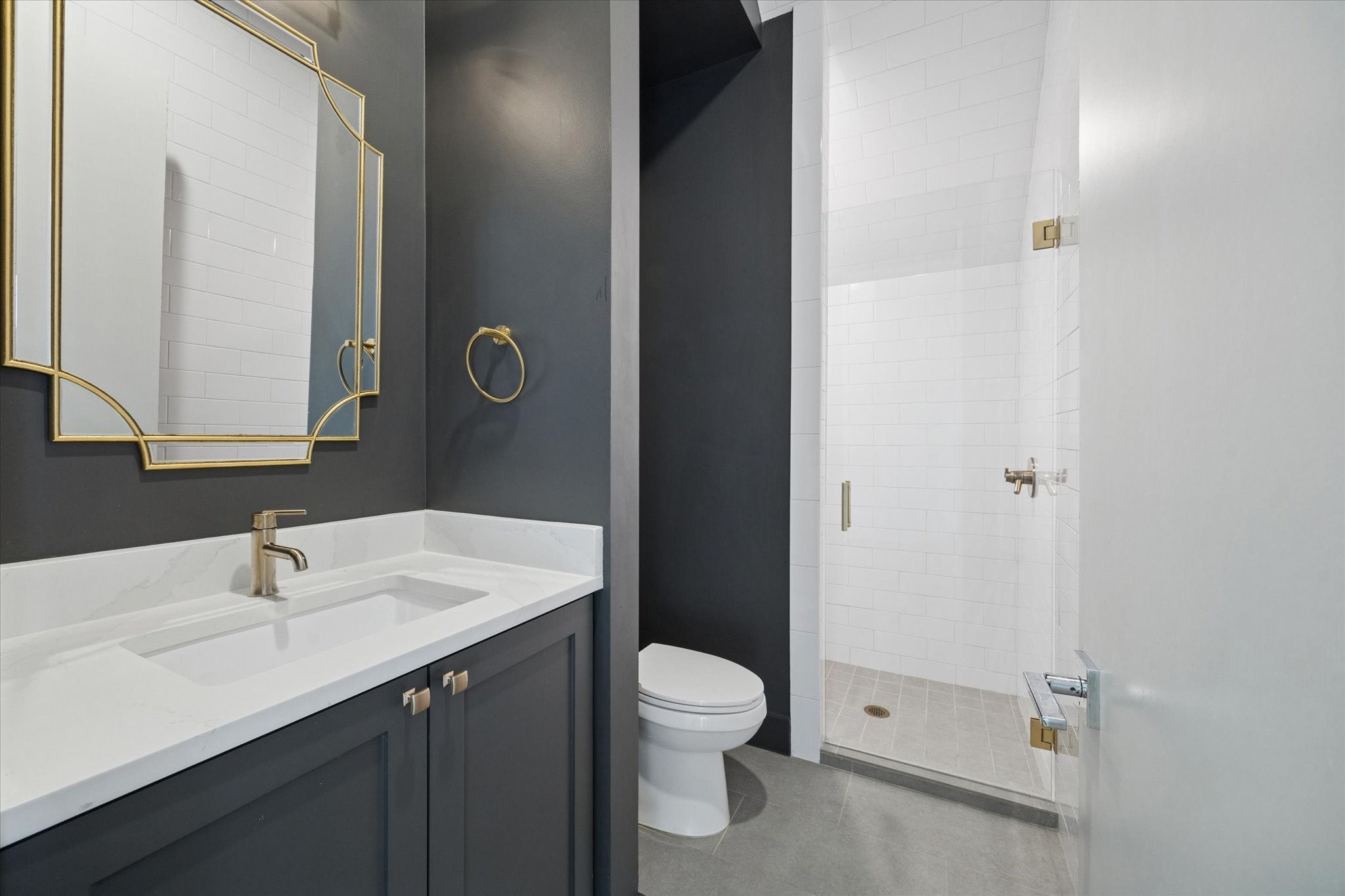 4219 Alba Road Houston, TX 77018 - Photo 17 of 37 a bathroom with a sink toilet and shower