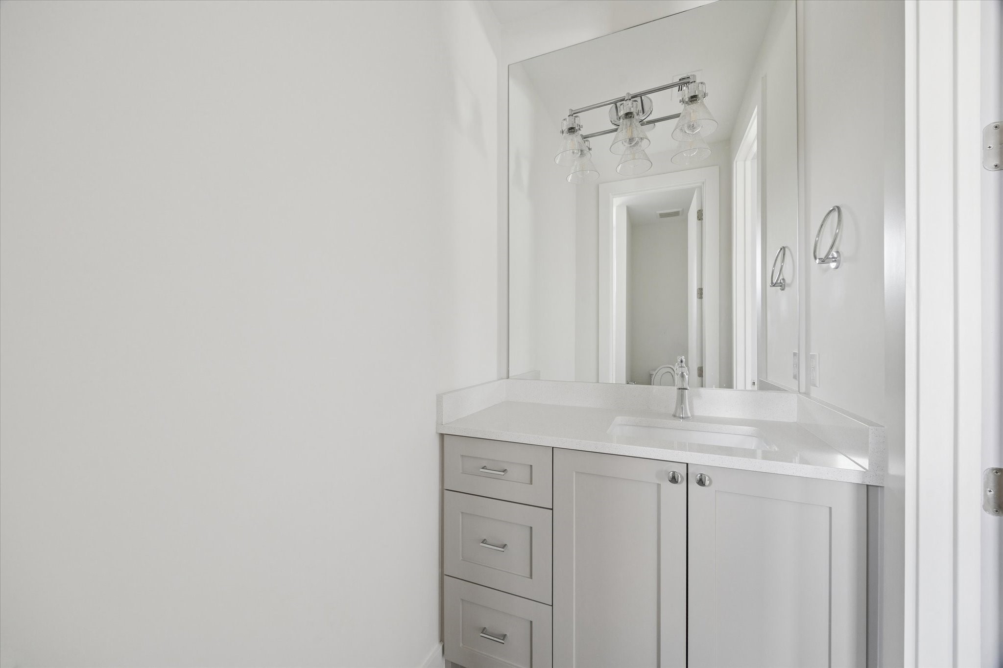 4219 Alba Road Houston, TX 77018 - Photo 31 of 37 a bathroom with a granite countertop sink and a mirror