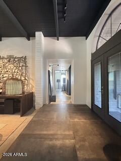 9545 East Romping Road, Unit 90 Carefree, AZ 85377 - Photo 12 of 32 a view of a hallway with a couch