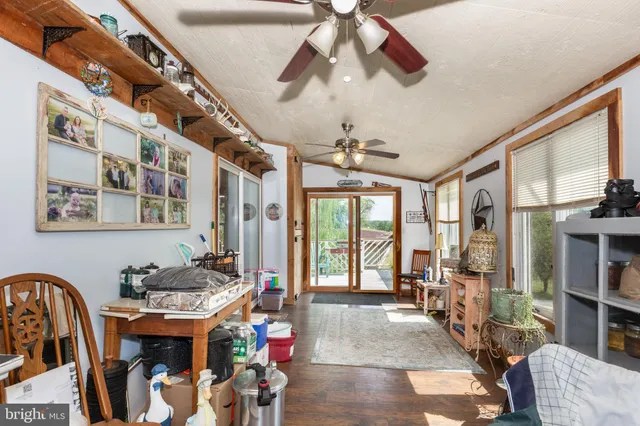 a bathroom with a sink toilet mirror and bathtub