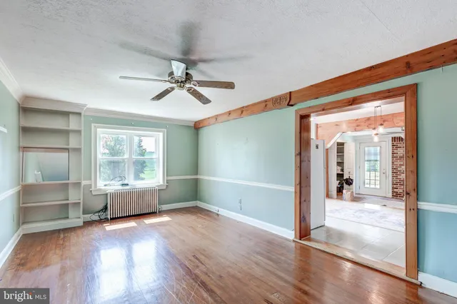 a view of a hallway view with hardwood floor