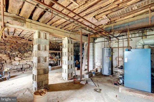 a view of a garage with a table and chairs