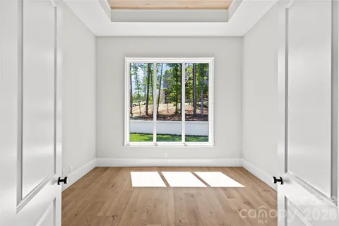 a bathroom with a sink and a window