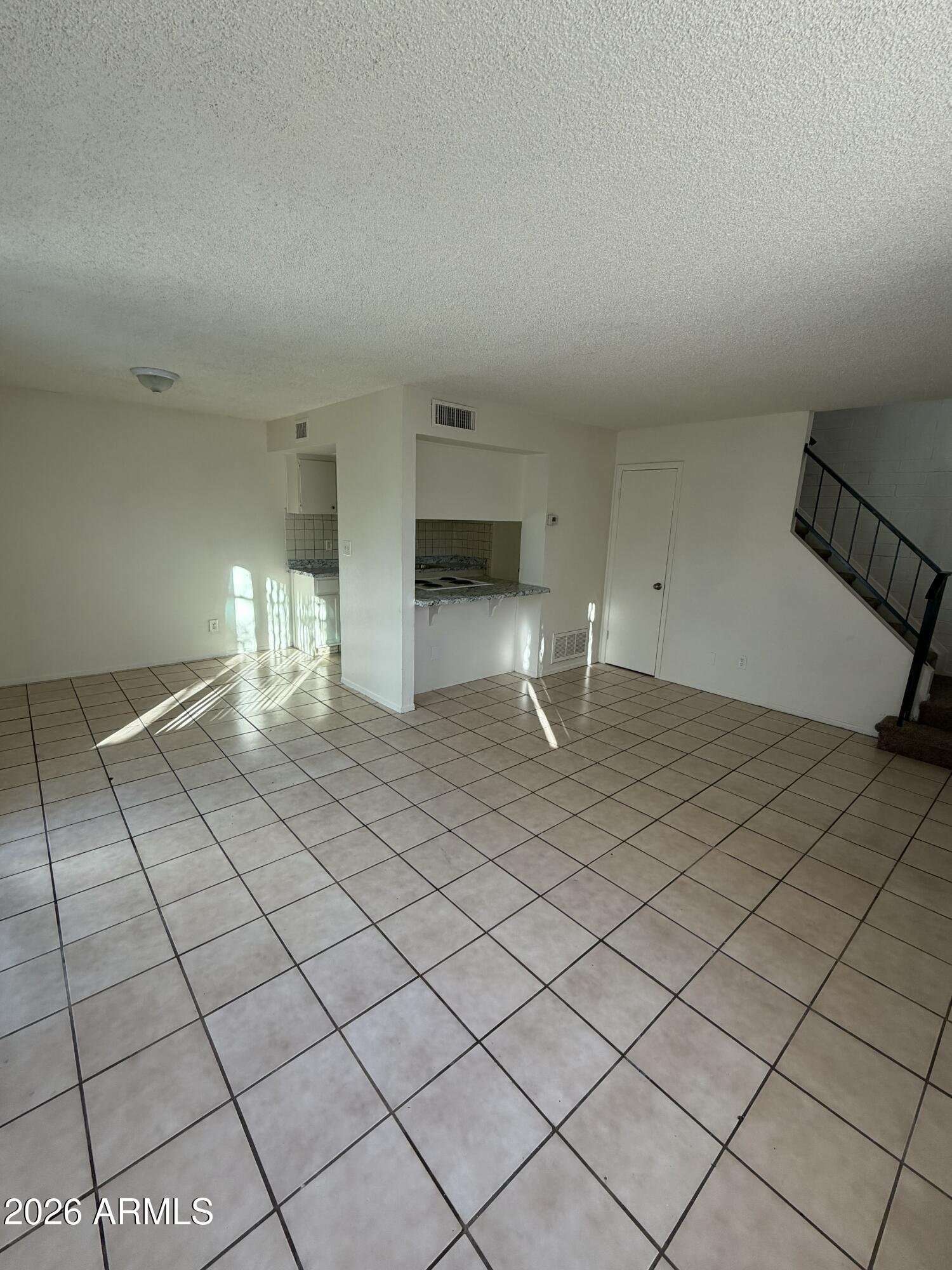 6817 West Devonshire Avenue Phoenix, AZ 85033 - Photo 2 of 11 a view of empty room