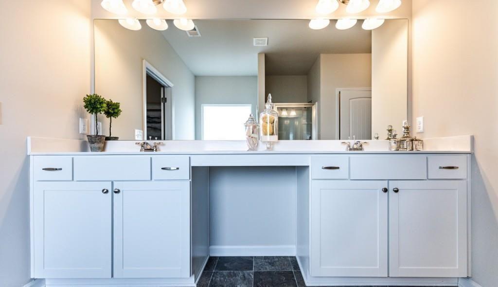 1234 Saddle Ridge Trail Calhoun, GA 30701 - Photo 16 of 18 a bathroom with a sink vanity and a mirror