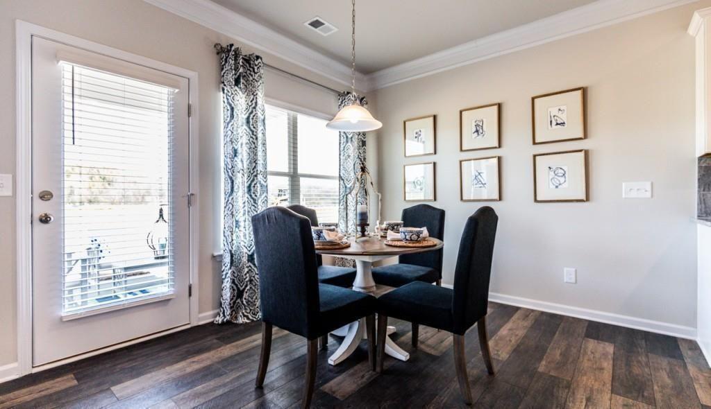 1234 Saddle Ridge Trail Calhoun, GA 30701 - Photo 6 of 18 a view of a workspace with furniture and a window