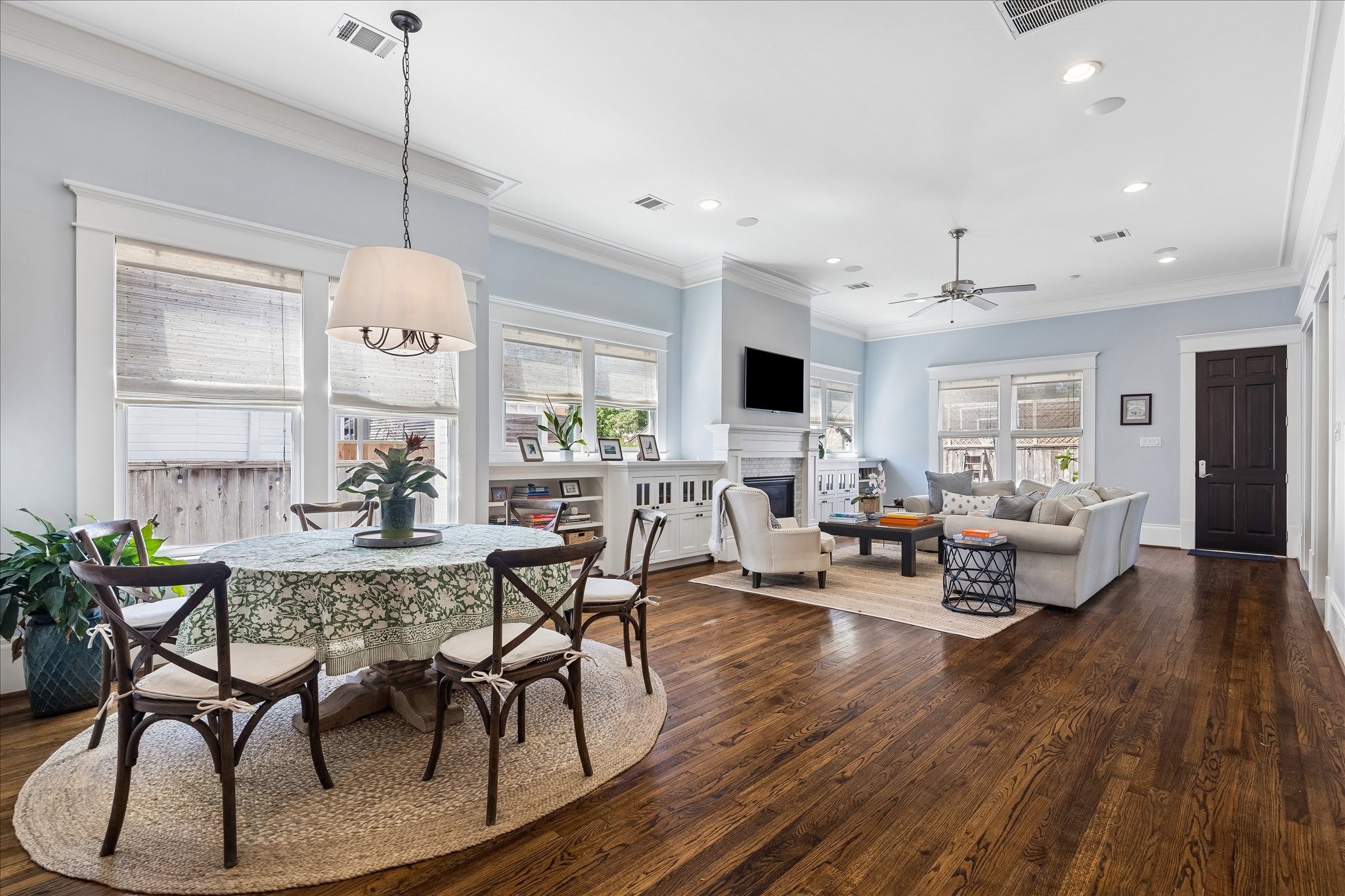 617 Harvard Street Houston, TX 77007 - Photo 11 of 39 a view of a dining room with furniture window and wooden floor