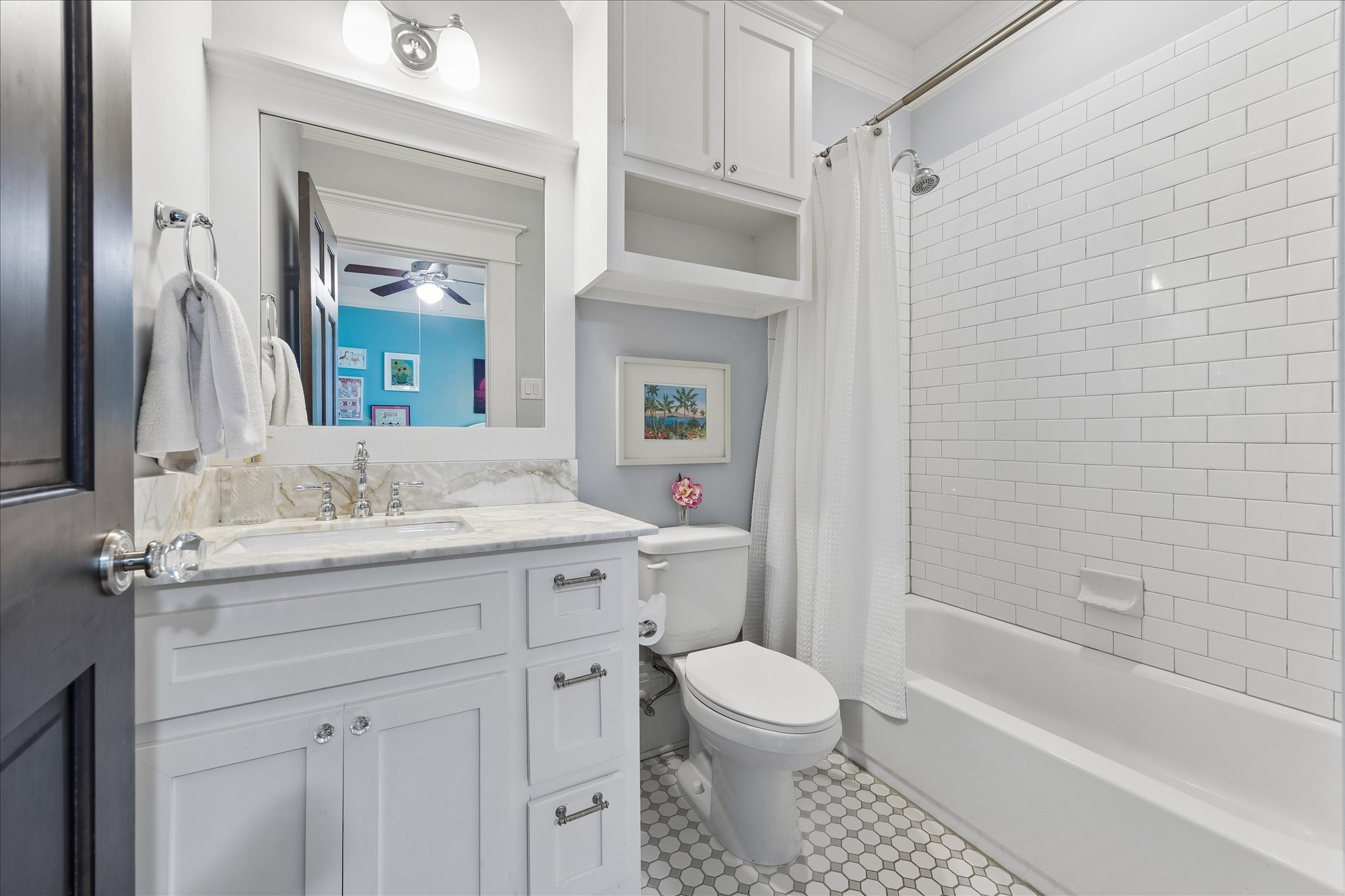 617 Harvard Street Houston, TX 77007 - Photo 26 of 39 a bathroom with a granite countertop sink toilet and shower