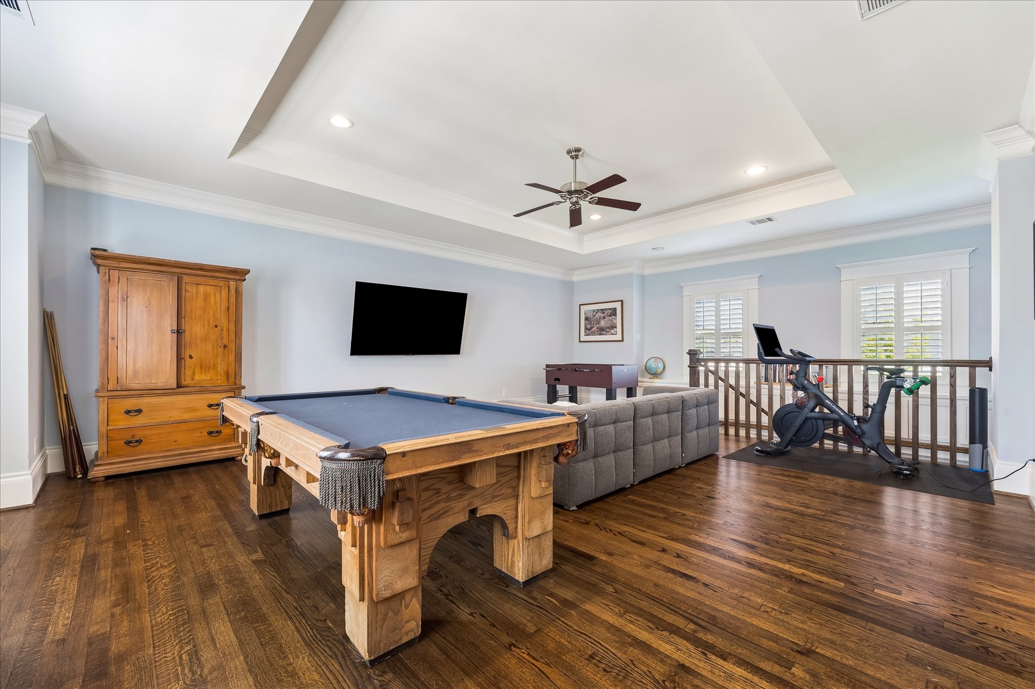 617 Harvard Street Houston, TX 77007 - Photo 30 of 39 a living room with furniture pool table and a wooden floor