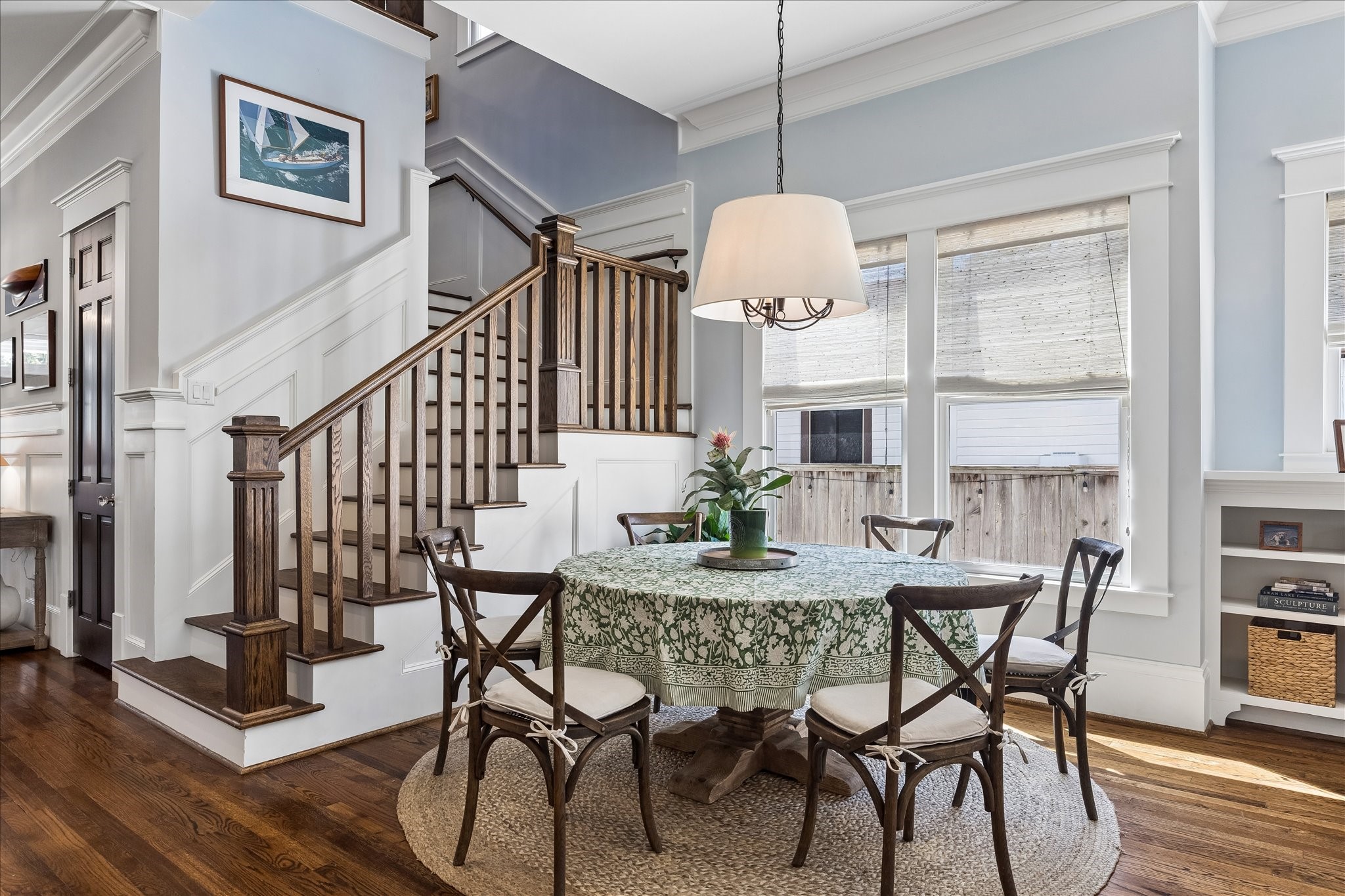 617 Harvard Street Houston, TX 77007 - Photo 10 of 39 a view of a dining room with furniture window and wooden floor