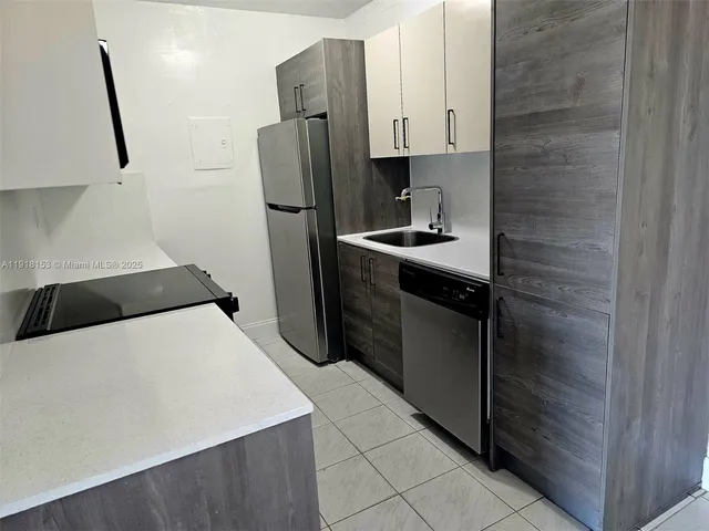 an empty room with a bathroom