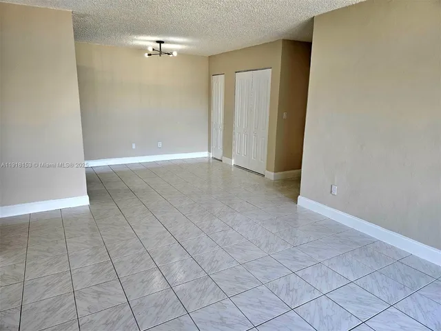 a bedroom with a bed and a bathroom