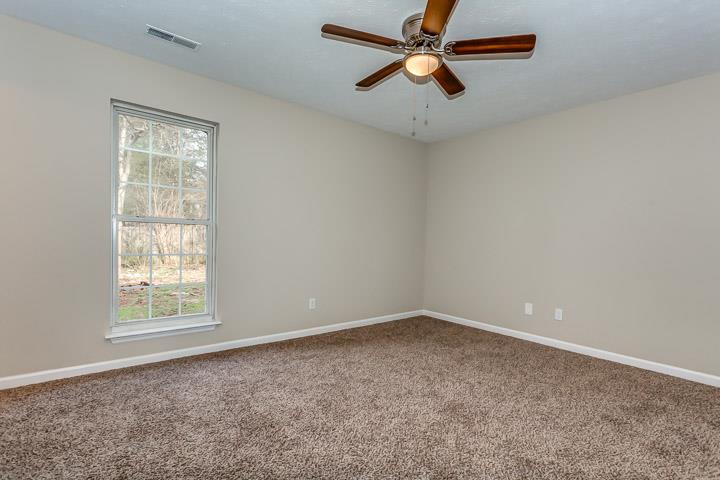 113 Rothwood Court Madison, TN 37115 - Photo 8 of 18 an empty room with a window and a fan