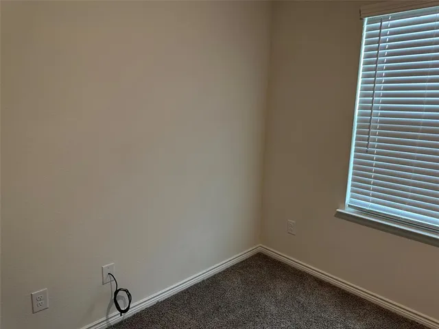 a view of a small space with window