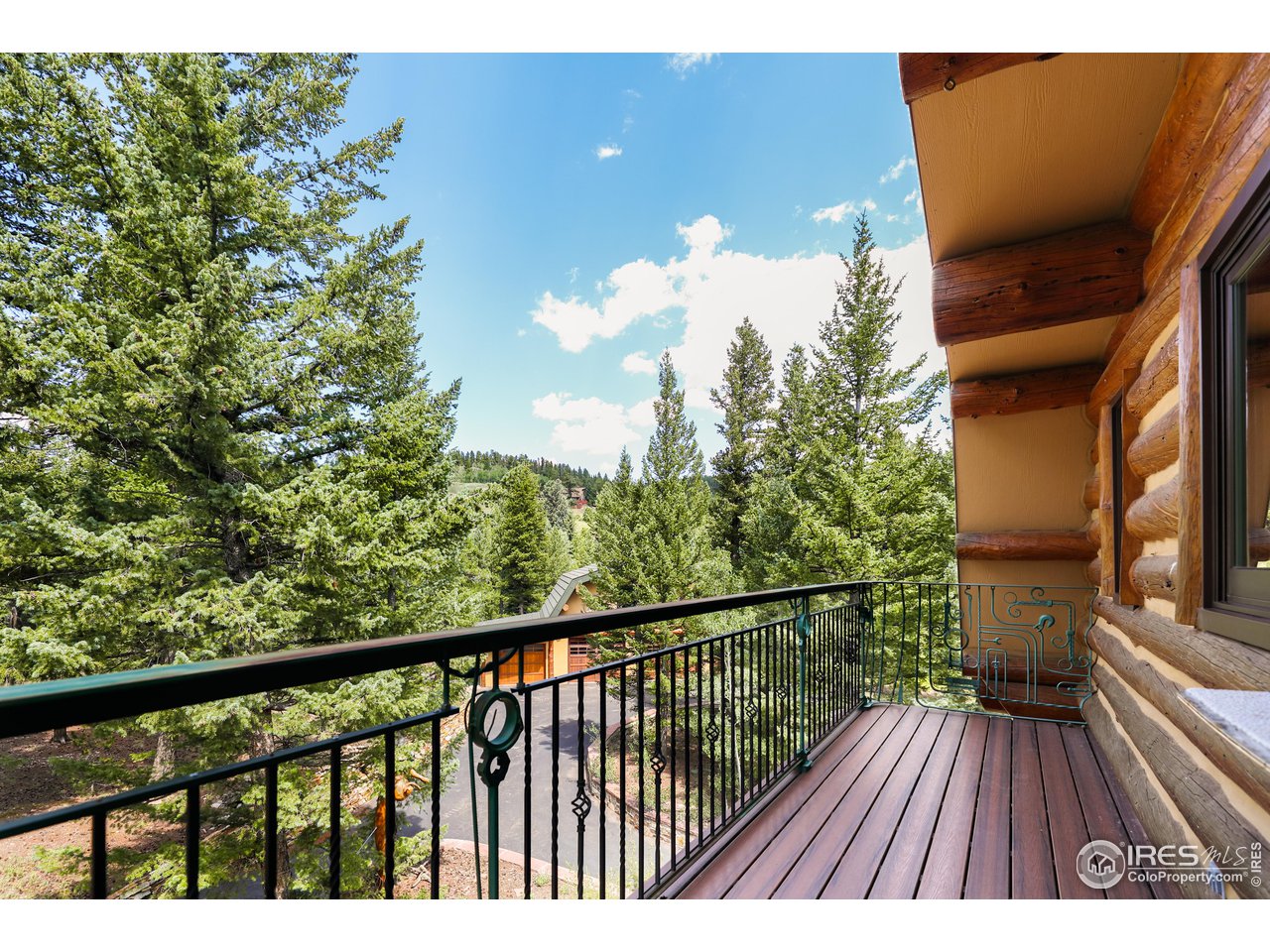 625 North Beaver Road Black Hawk, CO 80422 - Photo 23 of 40 a view of balcony with wooden floor