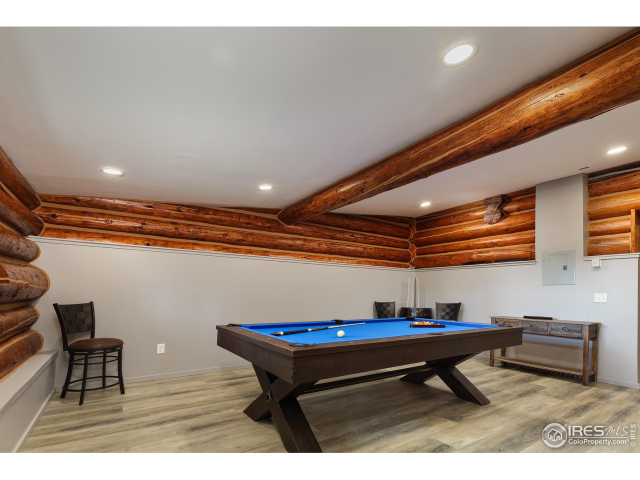 625 North Beaver Road Black Hawk, CO 80422 - Photo 26 of 40 a room with table chairs and wooden floor