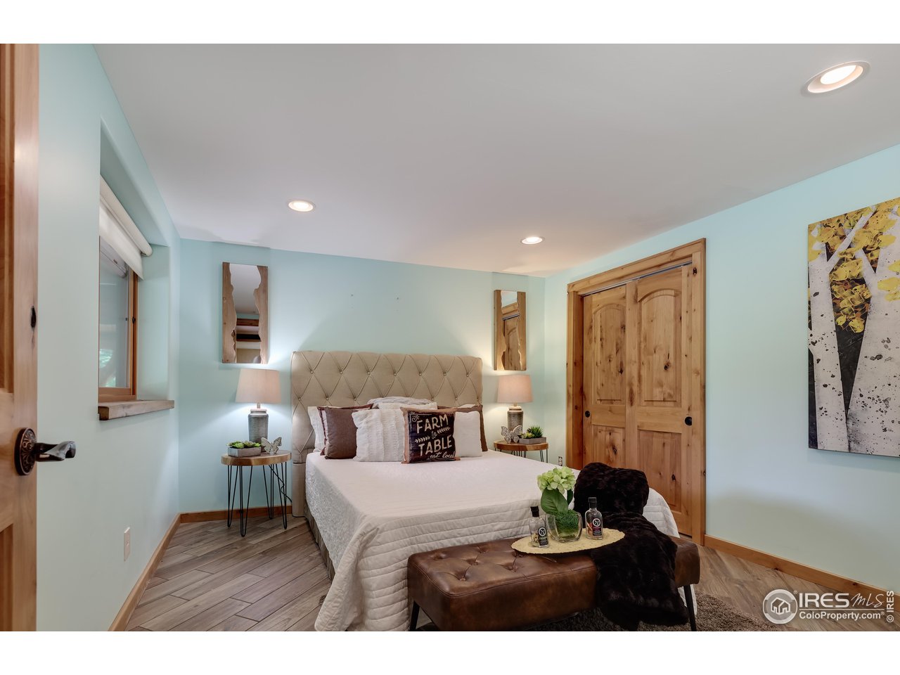 625 North Beaver Road Black Hawk, CO 80422 - Photo 29 of 40 a bed room with a bed and a painting