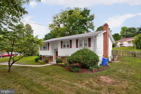front view of a house with a big yard