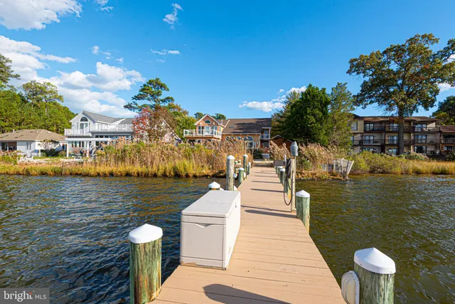 a view of a balcony with chairs