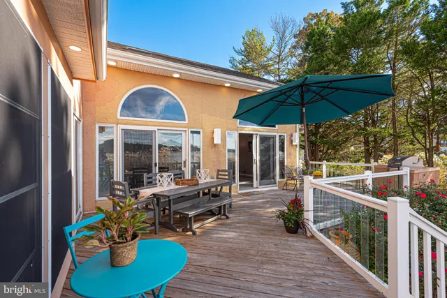 a view of a balcony with chairs