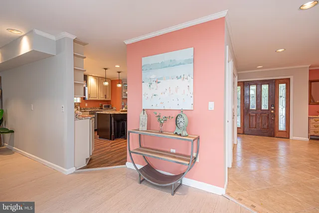 a view of a lake with houses in the back