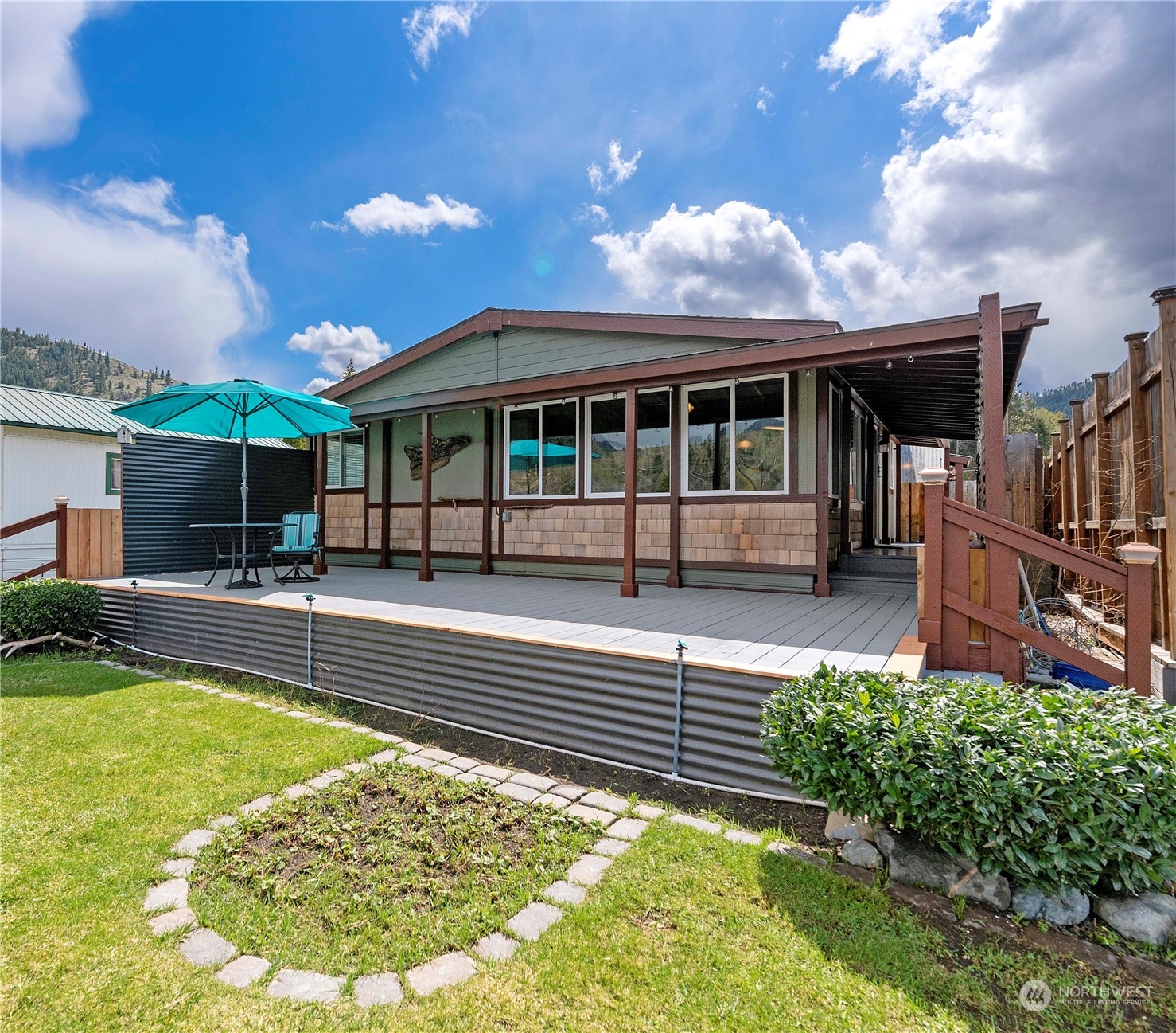 7900 Stine Hill Road, Unit 11 Cashmere, WA 98815 - Photo 1 of 39 a view of a house with swimming pool and a yard