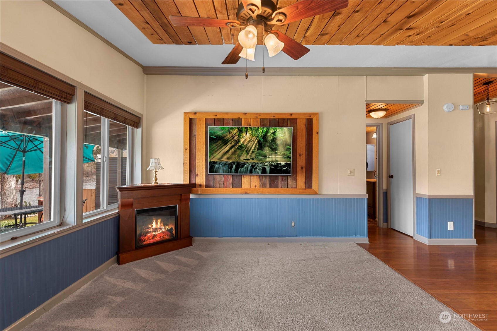 7900 Stine Hill Road, Unit 11 Cashmere, WA 98815 - Photo 11 of 39 a living room with fireplace and a window