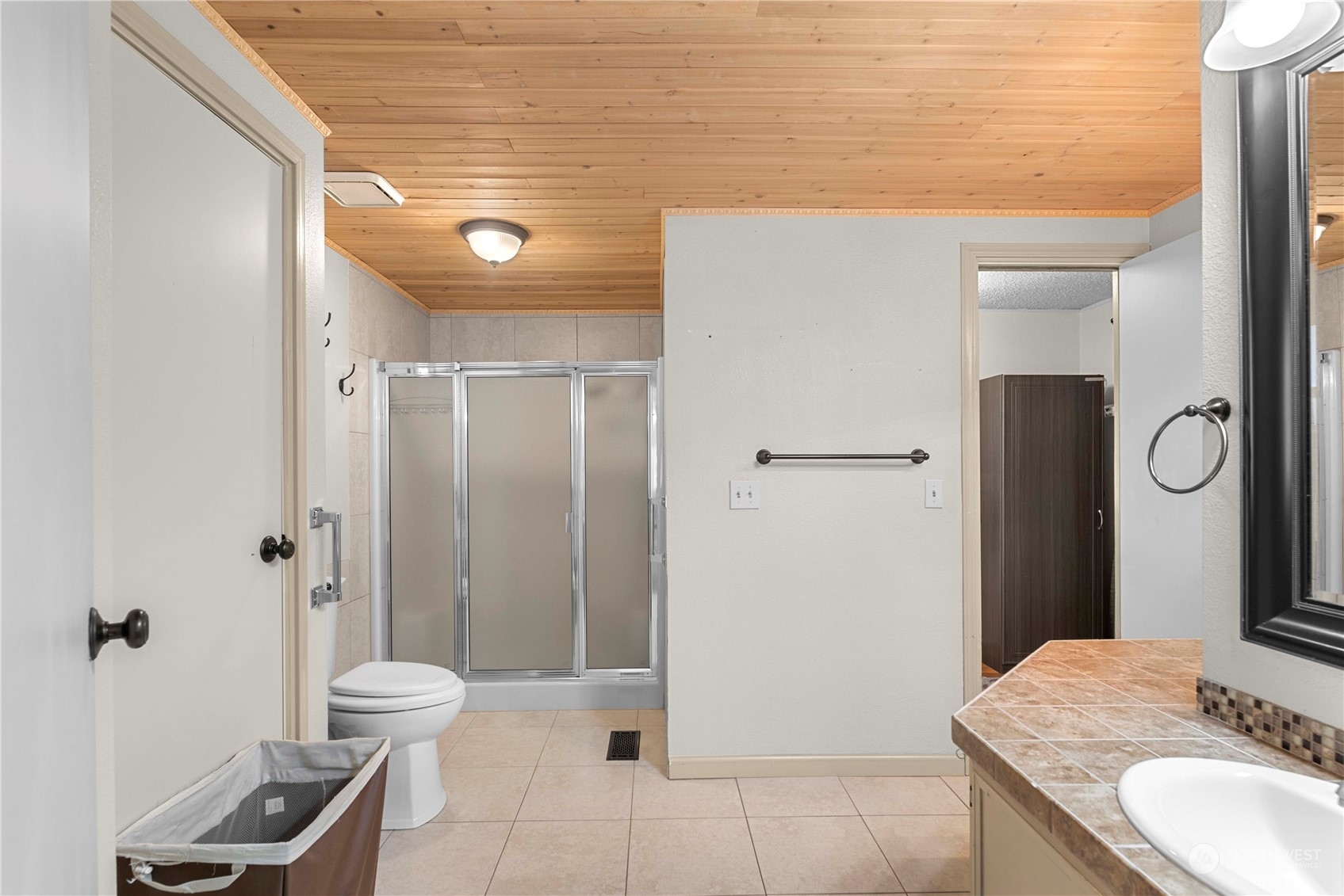 7900 Stine Hill Road, Unit 11 Cashmere, WA 98815 - Photo 19 of 39 a bathroom with a granite countertop sink toilet and shower