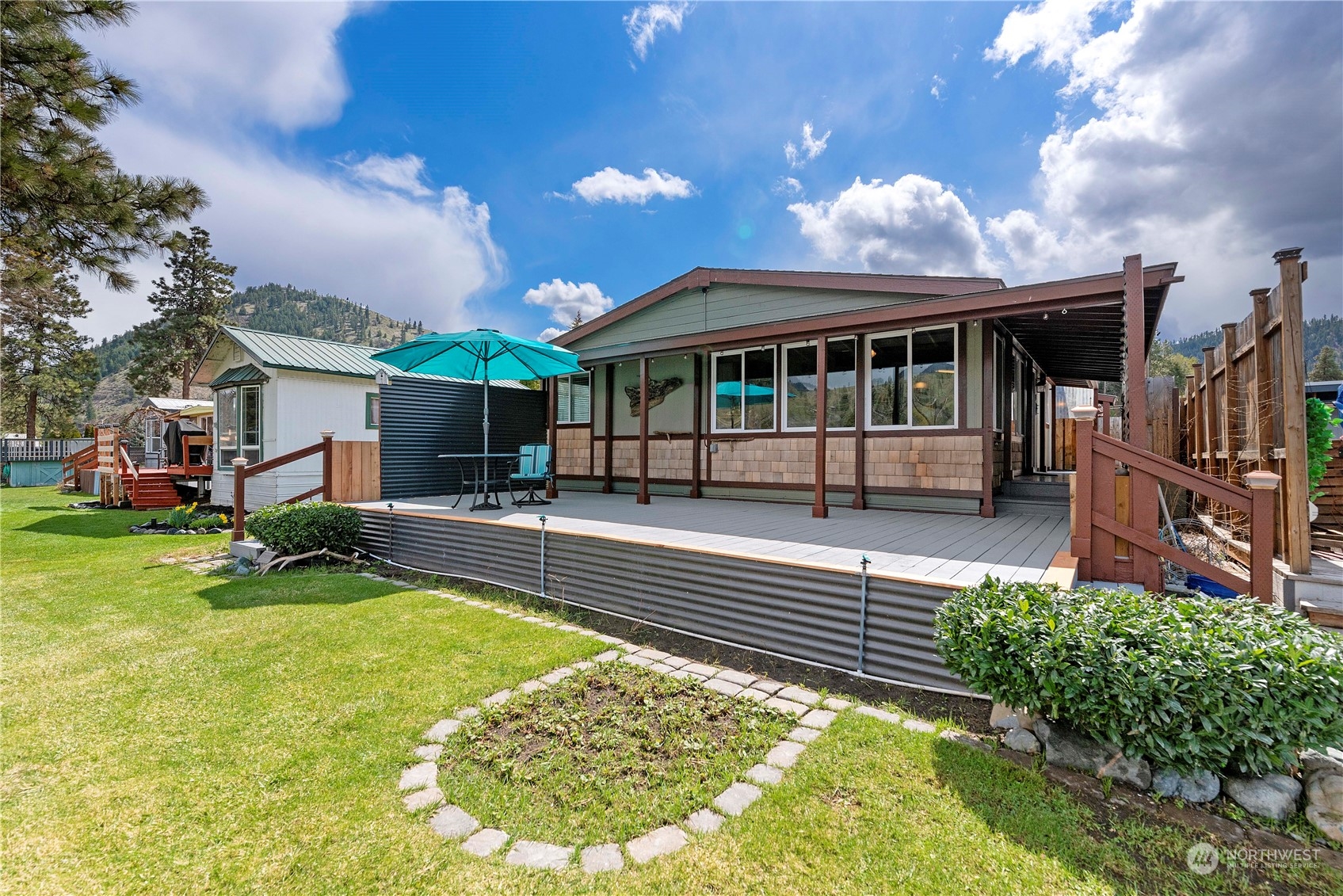 7900 Stine Hill Road, Unit 11 Cashmere, WA 98815 - Photo 28 of 39 a view of a house with swimming pool and sitting area