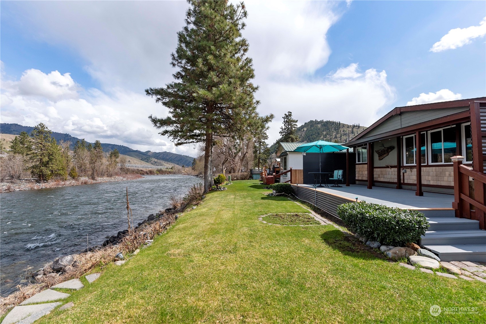 7900 Stine Hill Road, Unit 11 Cashmere, WA 98815 - Photo 29 of 39 a view of a house with swimming pool and sitting area