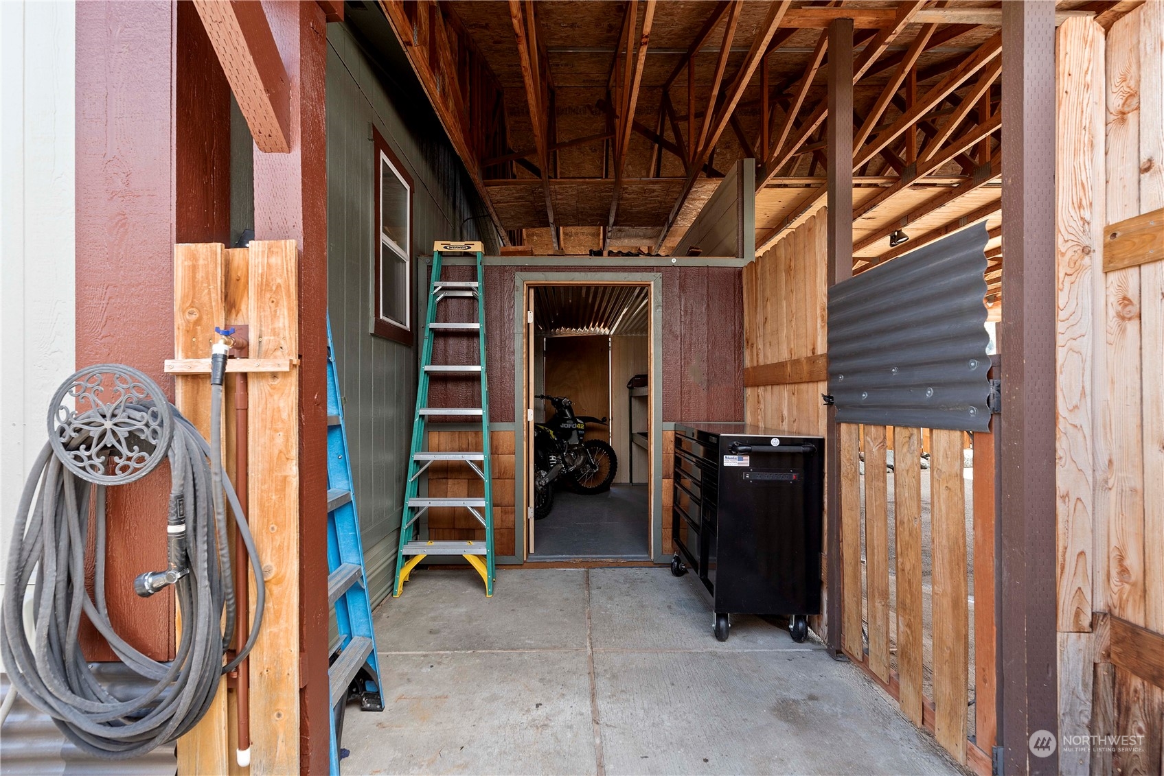 7900 Stine Hill Road, Unit 11 Cashmere, WA 98815 - Photo 35 of 39 a view of walk in closet with clothes and shoes