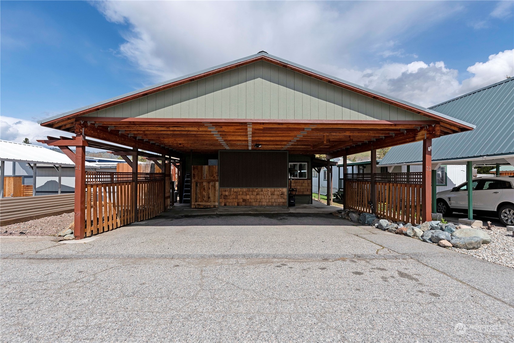 7900 Stine Hill Road, Unit 11 Cashmere, WA 98815 - Photo 36 of 39 a front view of a house with a patio