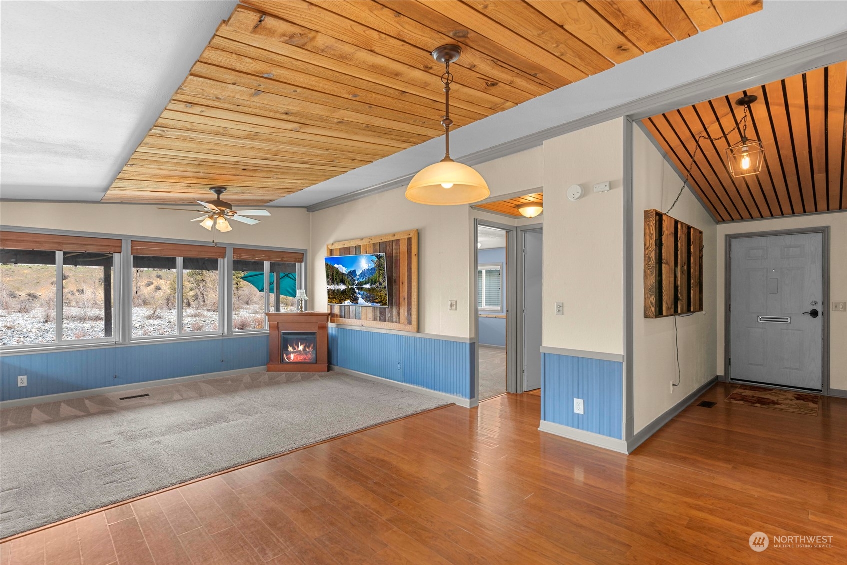 7900 Stine Hill Road, Unit 11 Cashmere, WA 98815 - Photo 5 of 39 wooden floor in an empty room with a window