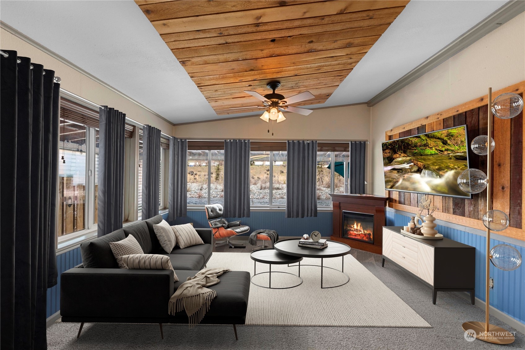 7900 Stine Hill Road, Unit 11 Cashmere, WA 98815 - Photo 8 of 39 a living room with furniture and a flat screen tv