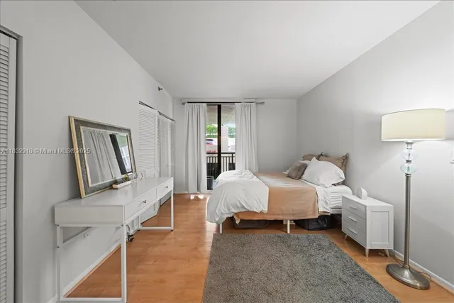 a bed room with a bed and a couch