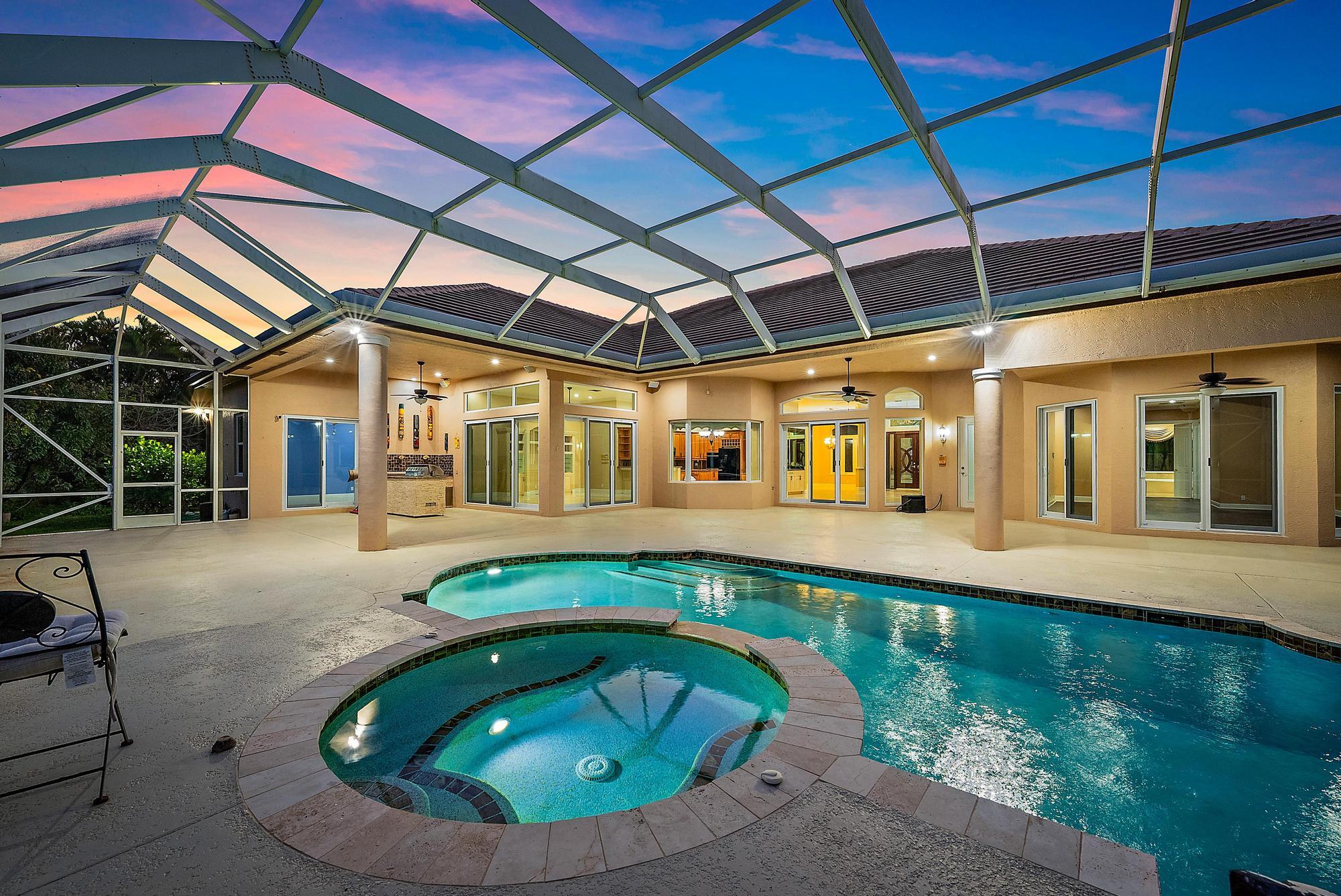 8480 Man O War Road Palm Beach Gardens, FL 33418 - Photo 2 of 45 Screened in Pool