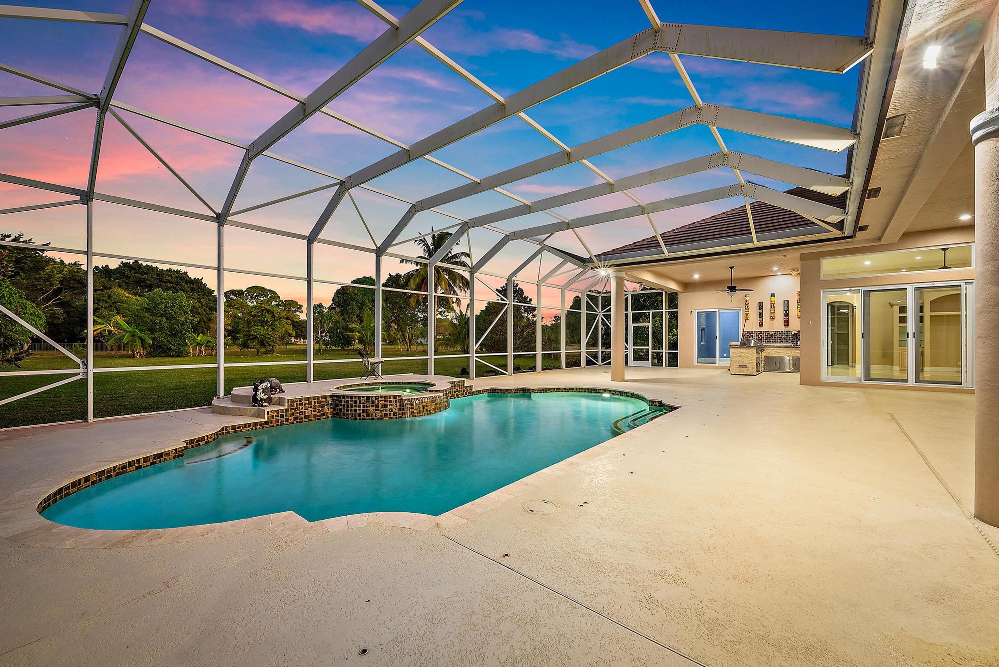 8480 Man O War Road Palm Beach Gardens, FL 33418 - Photo 28 of 45 Screened in Pool