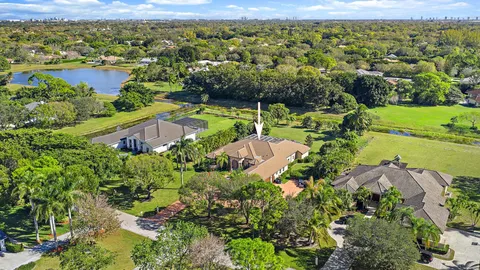a view of a lake with a swimming pool