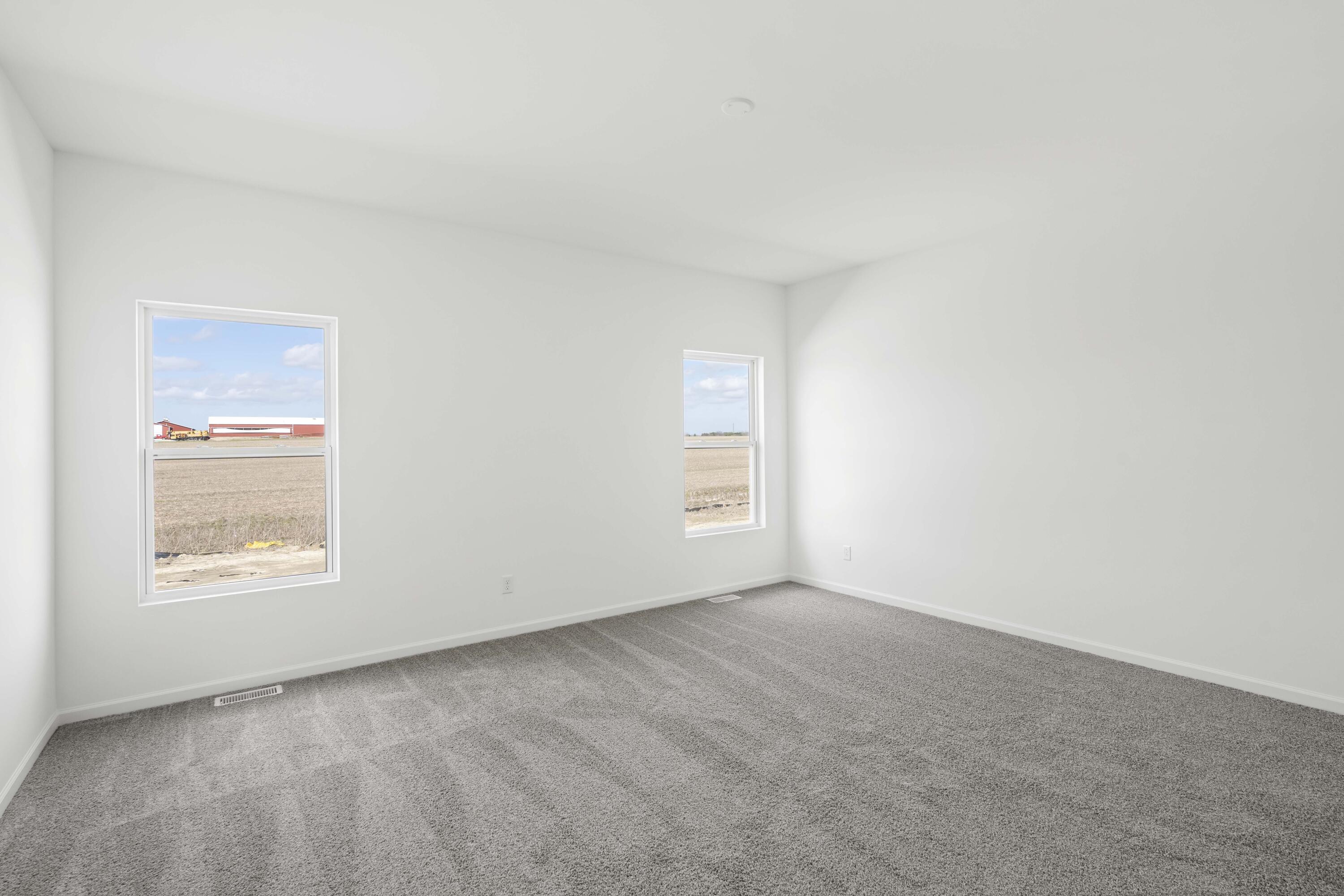 6561 East 103rd Avenue Crown Point, IN 46307 - Photo 8 of 11 an empty room with a window