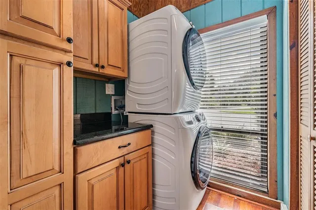 a view of a door and a window