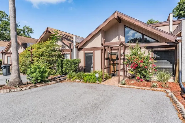 front view of a house with a small yard