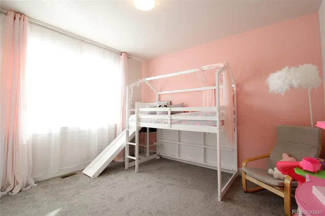 a room with a desk and chair