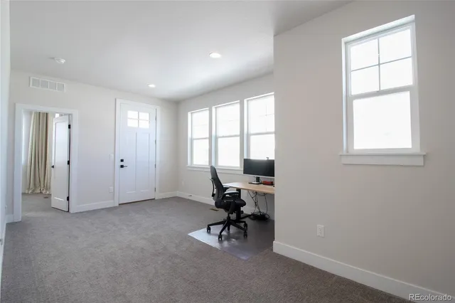 a view of a livingroom with a window