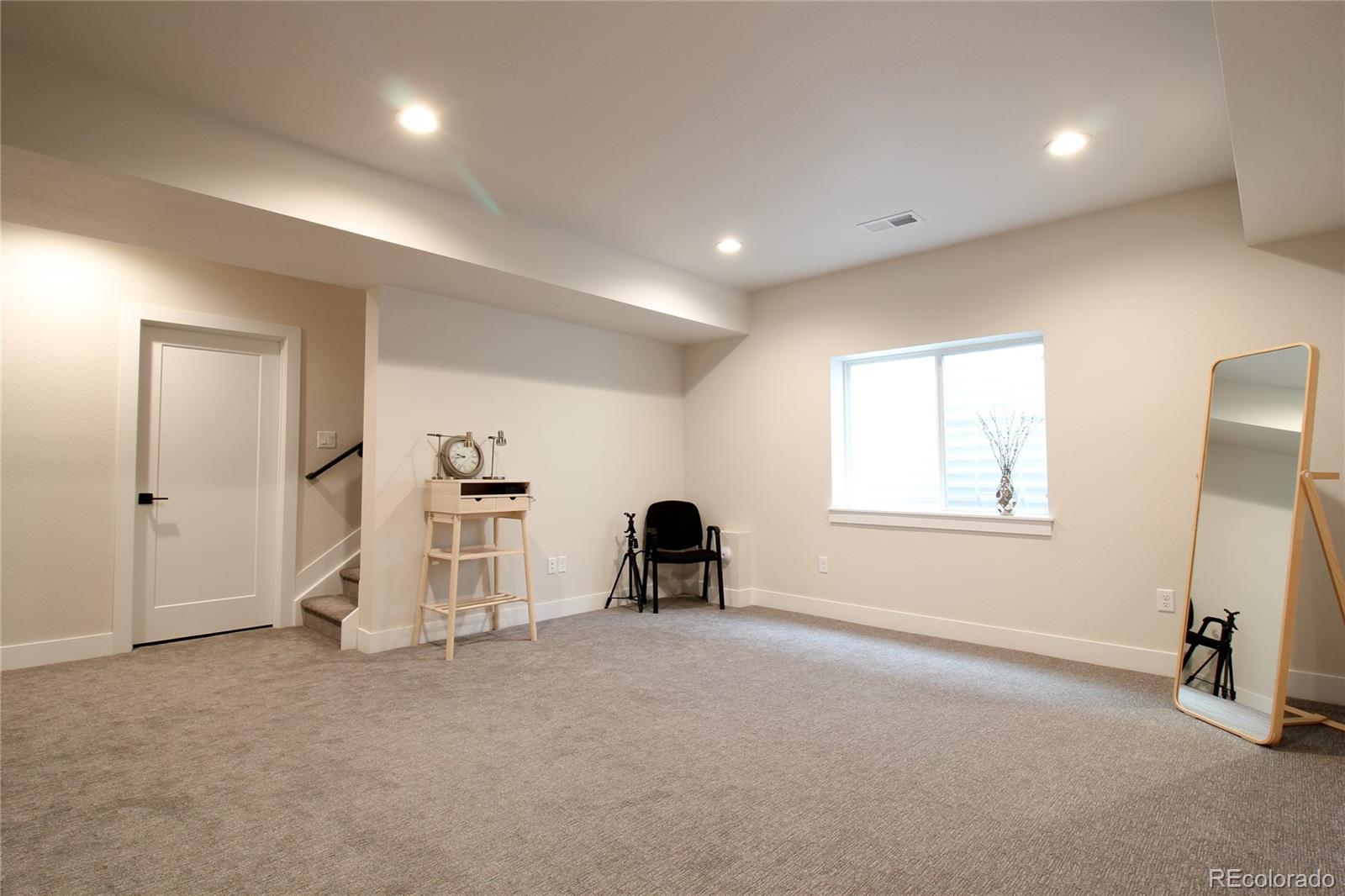 10394 Detroit Street Denver, CO 80229 - Photo 43 of 50 a view of a room with gym equipment