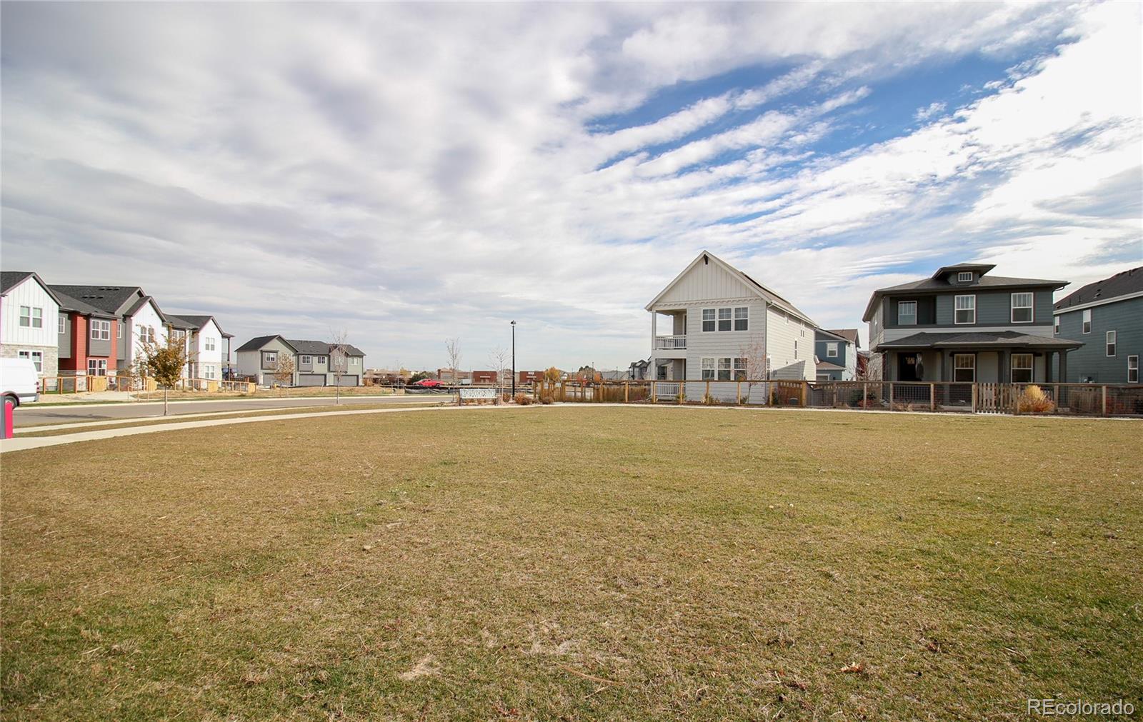 10394 Detroit Street Denver, CO 80229 - Photo 46 of 50 a view of houses with an ocean
