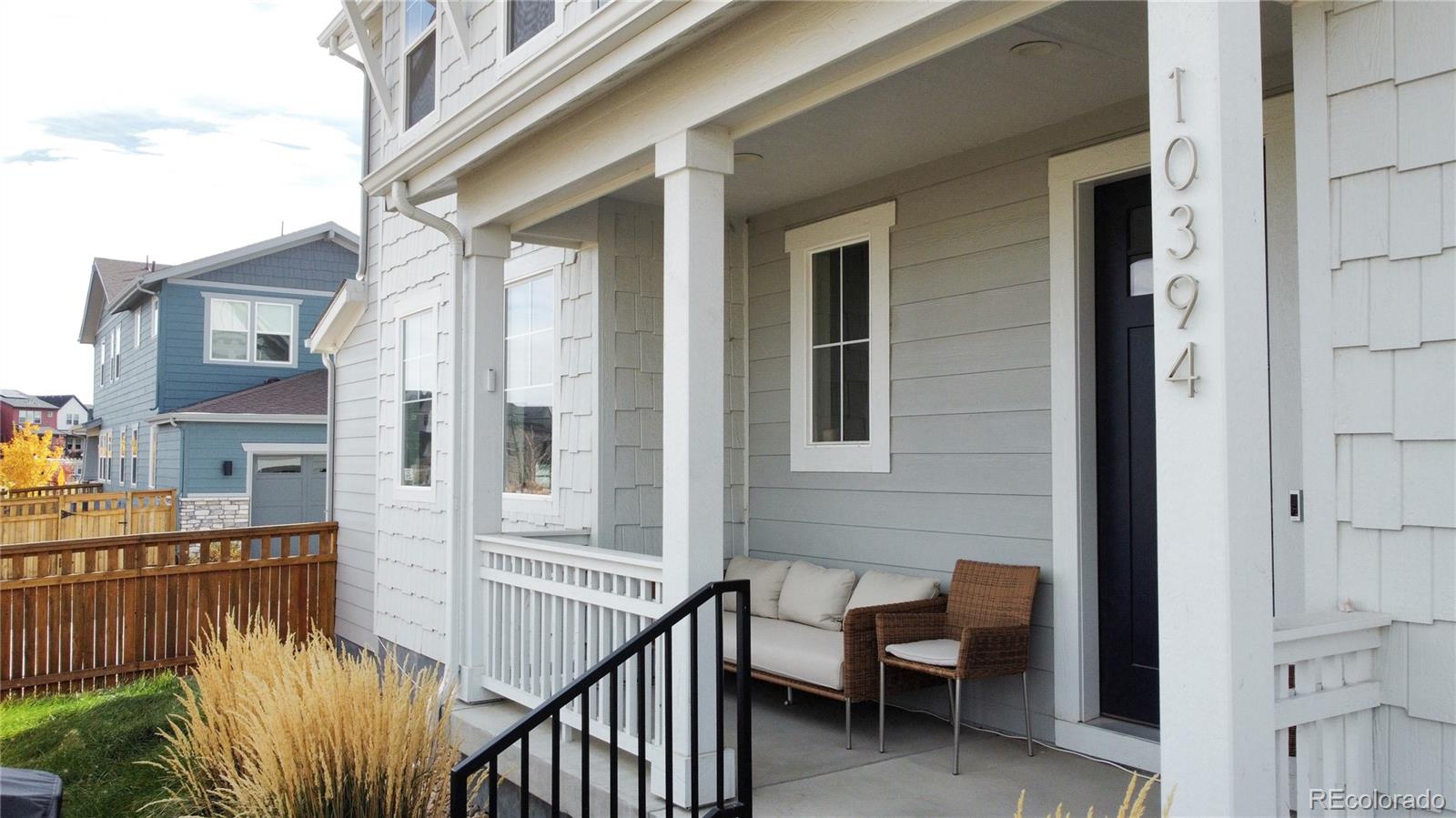 10394 Detroit Street Denver, CO 80229 - Photo 50 of 50 a view of a balcony with furniture